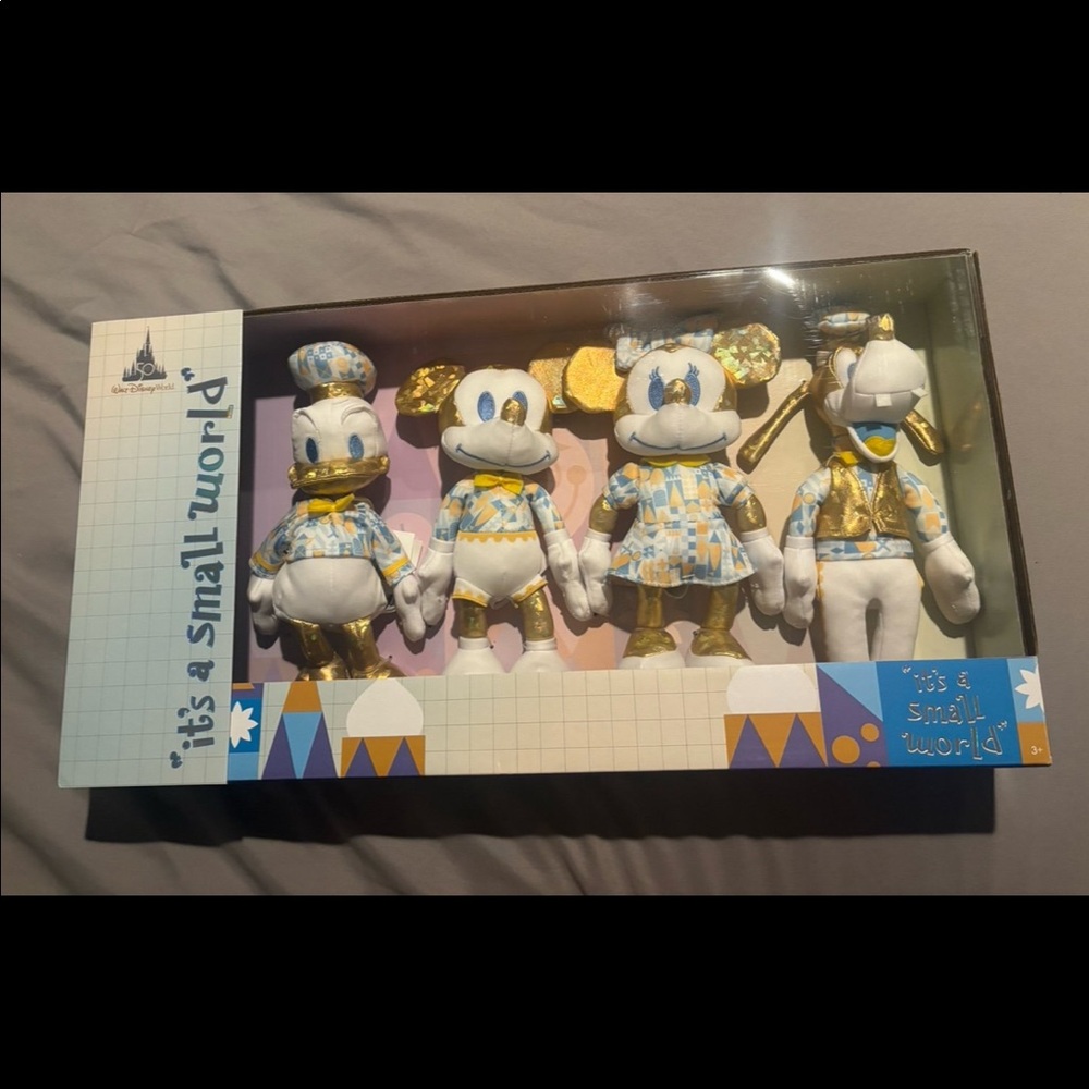 Disney 50th anniversary it’s a small world plush toys